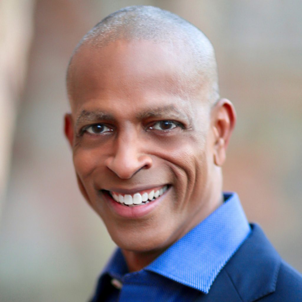 Headshot of Byron Darden smiling.